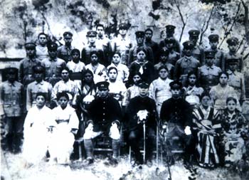 Native-Taiwanese volunteer soldiers,their wives and Japanese policemen who lead them